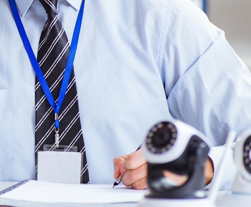 Technician Preparing Video Surveillance Systems Technology for Installation